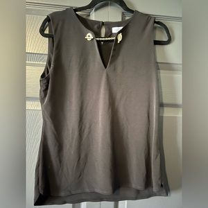 Black Calvin Klein top with gold accents